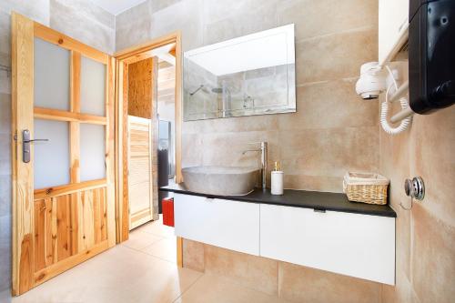 Kúpeľňa v ubytovaní Apartamenty Liberta
