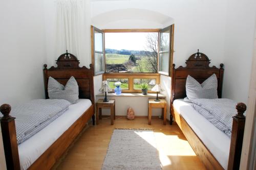 מיטה או מיטות בחדר ב-Ultra Alpes Ludwig Suite