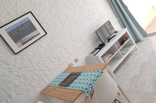 Kuchyň nebo kuchyňský kout v ubytování Front Beach Jandía Apartment