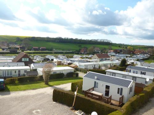 an aerial view of a small town with houses at Auberge des Etangs in Roussent