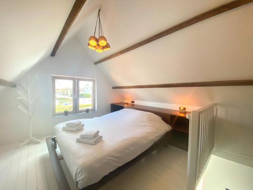 Postel nebo postele na pokoji v ubytování Vakantiehuis Domburg DO33