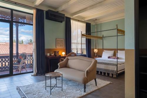 Postel nebo postele na pokoji v ubytování Communal Hotel Telavi
