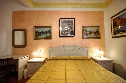 Cama o camas de una habitación en B&B In Centro a Pacentro