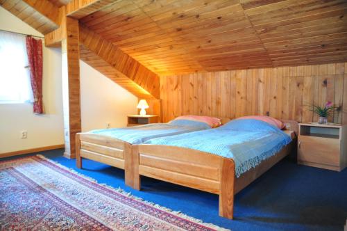 Postel nebo postele na pokoji v ubytování Villa Swarzewo