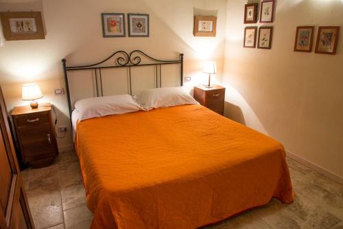 Postel nebo postele na pokoji v ubytování Agriturismo Il Sambuco