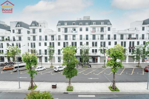 an architectural rendering of a large white building at Merry House Imperia in Hai Phong