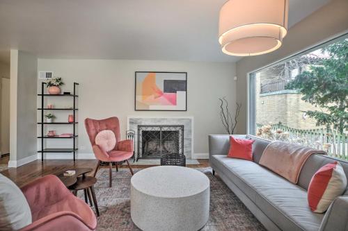 a living room with a couch and a fireplace at Home with Office and Yard 25 Mi to Downtown Chicago! in Glen Ellyn