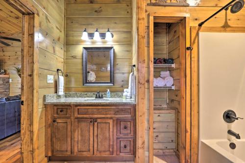 Bathroom sa Rustic Pigeon Forge Cabin with Hot Tub Near Town!
