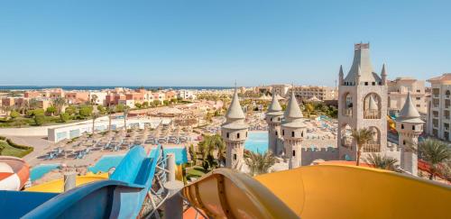 a view of a resort with a pool and buildings at Serenity Alma Heights - Ex Serenity Fun City in Hurghada