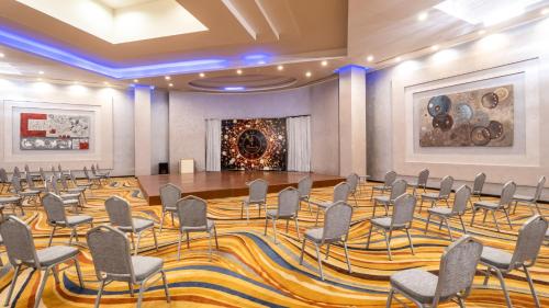 a conference room with a large table and chairs at Serenity Alma Heights - Ex Serenity Fun City in Hurghada