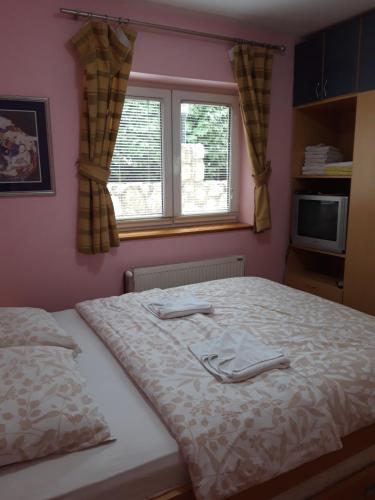 Postel nebo postele na pokoji v ubytování Villa Dama & Dubravka