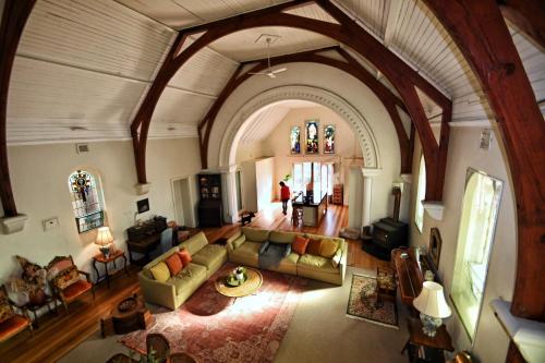 an overhead view of a living room with a couch at A Tassie Church in Kempton