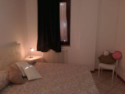 Letto o letti in una camera di Appartamento Relax al Borgo