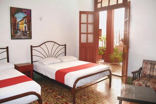 Katil atau katil-katil dalam bilik di Hotel Margarita