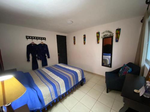 Ένα ή περισσότερα κρεβάτια σε δωμάτιο στο Hotel Boutique Calderon