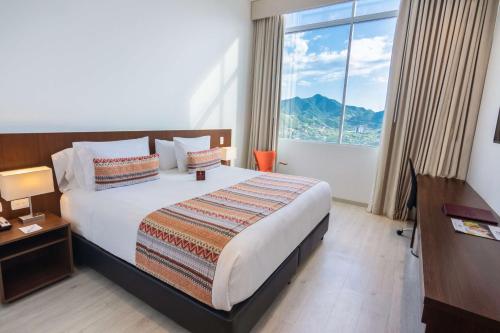 Ліжко або ліжка в номері Best Western Plus Santa Marta Hotel