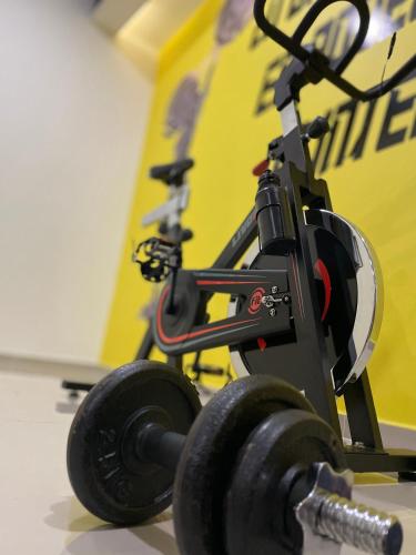 a robot with two large wheels on a table at Hotel Santa Clara Boutique in Montería