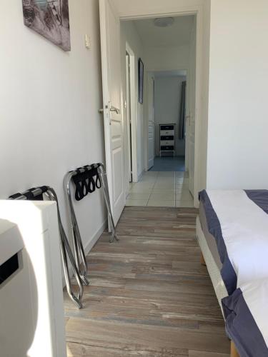 Ένα ή περισσότερα κρεβάτια σε δωμάτιο στο Maison Lermarin 85