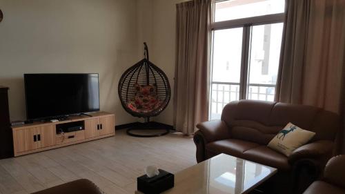 TV a/nebo společenská místnost v ubytování Shimmer B&B