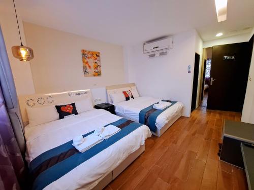 Postel nebo postele na pokoji v ubytování Hiinn B&B