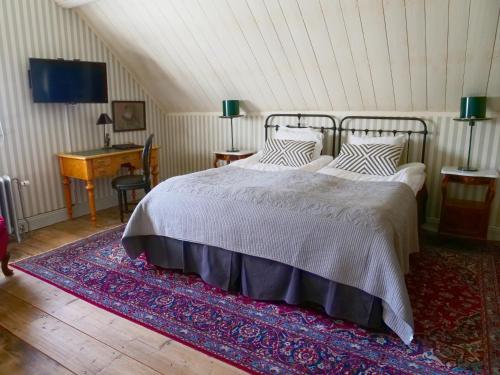 Katil atau katil-katil dalam bilik di Dufweholms Herrgård