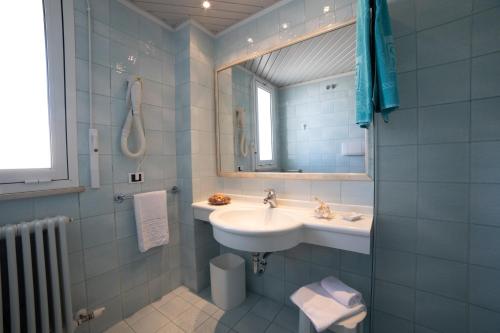 Ett badrum på Residence Hotel Club House