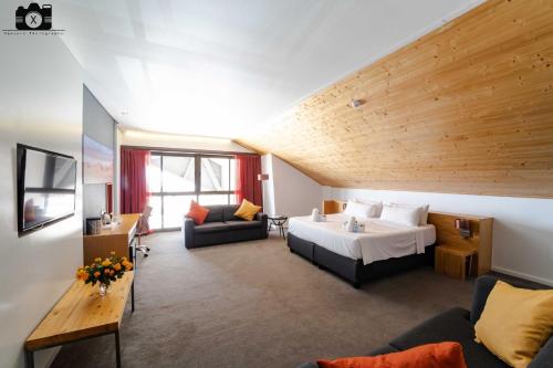 Ένα ή περισσότερα κρεβάτια σε δωμάτιο στο MTC Dome Hotel Swakopmund