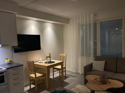 Hotel Lost in Leviにあるテレビまたはエンターテインメントセンター