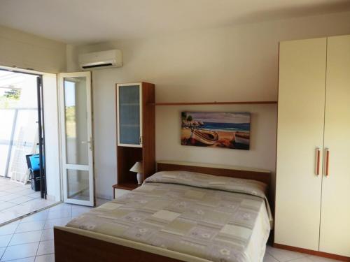 Postel nebo postele na pokoji v ubytování I tulipani di Torre Pali
