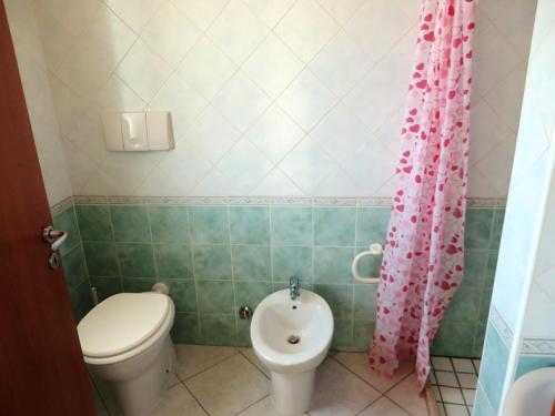 Koupelna v ubytování I tulipani di Torre Pali