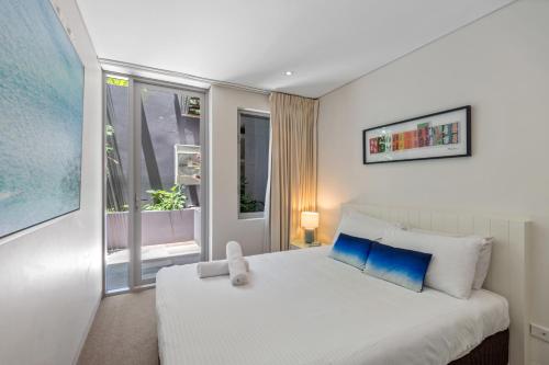 Ein Bett oder Betten in einem Zimmer der Unterkunft The Rise Noosa