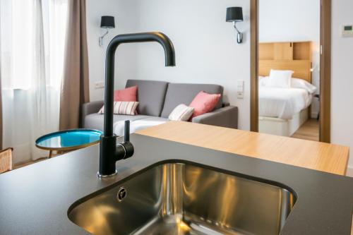 Posezení v ubytování Aquitania Home Suites
