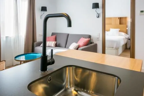 Aquitania Home Suites photo 32