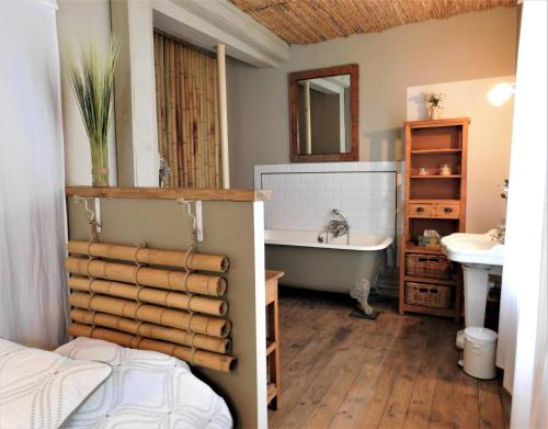 Ванна кімната в Le Prieure Saint Louis