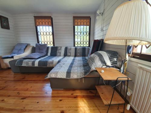 Tempat tidur dalam kamar di Ranczo Targowe