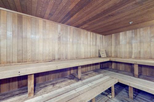 a empty wooden sauna with wooden benches in it at Copper Springs Lodge 430 in Copper Mountain