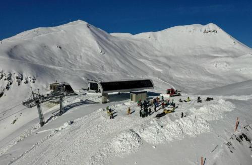 a group of people on a snow covered mountain at New Gudauri, Loft 2 in Gudauri