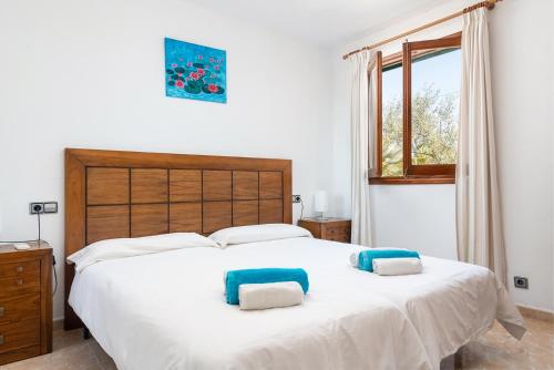 Posteľ alebo postele v izbe v ubytovaní Son Rotger, villa Tía Catalina con piscina en Alcudia
