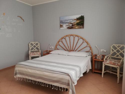 เตียงในห้องที่ Villetta Garibaldi