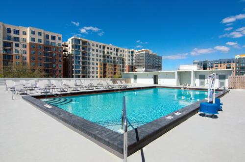 a swimming pool on the roof of a building at Holiday Inn Gainesville-University Center by IHG in Gainesville