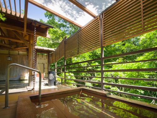 a view of the outside of a house with a plunge pool at Jizaiso in Nasu