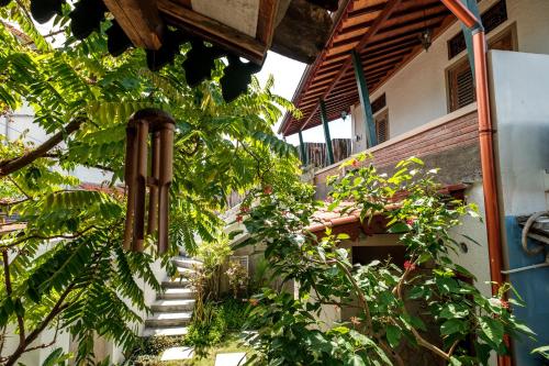 a row of stairs leading up to a balcony at Nextdoor Homestay in Yogyakarta