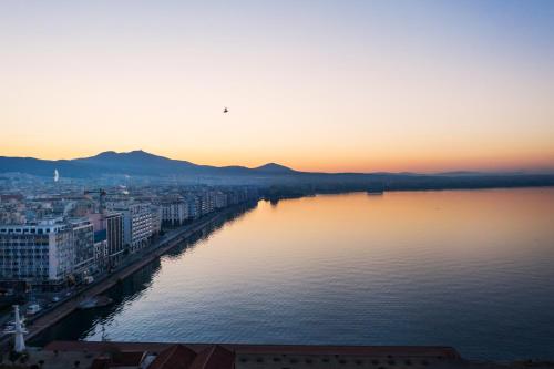 a large body of water with a city skyline at Noa Premium stay in Thessaloniki