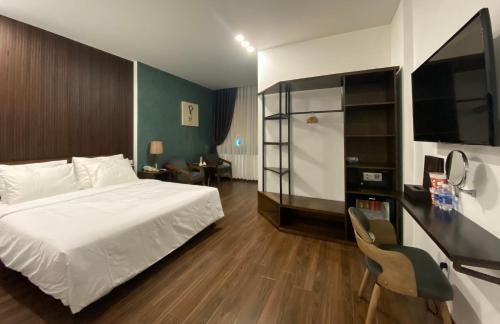 Ένα ή περισσότερα κρεβάτια σε δωμάτιο στο HighLight House