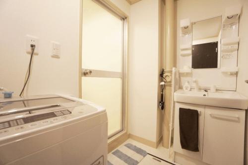 Ванная комната в H2O Stay Kikukawa Woody Sunheim #201