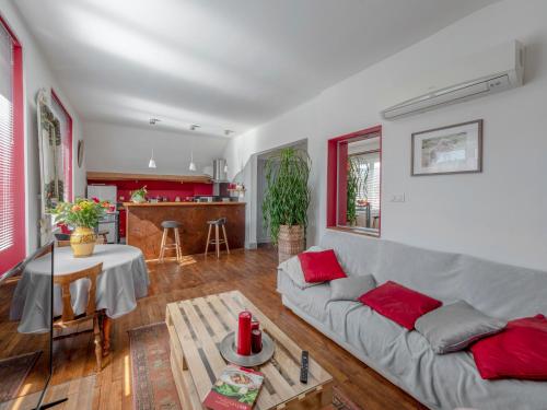 a living room with a couch and a table at Engie in Gaillac-dʼAveyron