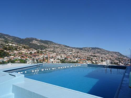 Bazén v ubytování Hotel Monte Carlo nebo v jeho okolí