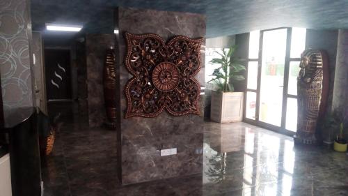 a wall with a picture on it in a room at Aqua Royal Alexus Luxury Holiday Apartments Girne in Kérynia
