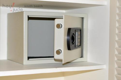 a white wall mounted safe with a window at Signature Boracay South Beach in Boracay