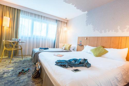 Katil atau katil-katil dalam bilik di ibis Styles Tours Sud